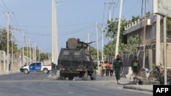 FILE - Security forces patrol the streets following an attack by suspected al-Shabab militants in the Somalia's capital Mogadishu, Feb. 21, 2023.