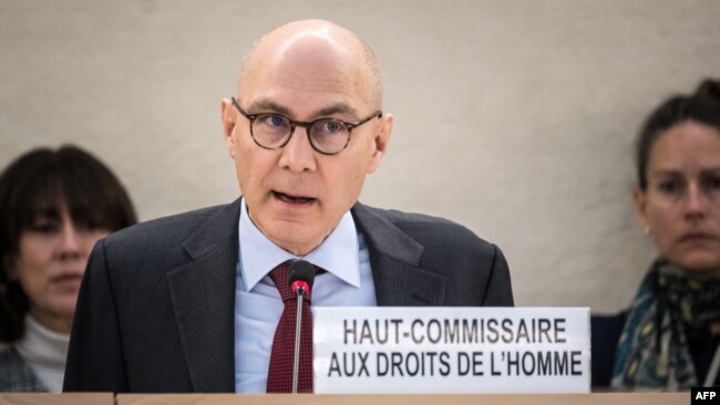FILE - U.N. High Commissioner for Human Rights Volker Türk delivers a report at the 55th session of the Human Rights Council in Geneva, Feb. 29, 2024.