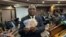 John Mushayavanhu, the new governor or the Reserve Bank of Zimbabwe, displays new banknotes of the country's currency to reporters, in Harare, April 5, 2024. (Columbus Mavhunga/VOA)