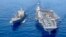 The USS Gerald R. Ford aircraft carrier refuels from the underway replenishment oiler USNS Laramie in the eastern Mediterranean Sea, Oct. 11, 2023. (U.S. Navy photo via AP)