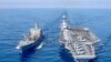 The USS Gerald R. Ford aircraft carrier refuels from the underway replenishment oiler USNS Laramie in the eastern Mediterranean Sea, Oct. 11, 2023. (U.S. Navy photo via AP)