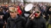 FILE - Proud Boys members Zachary Rehl, left, and Ethan Nordean walk toward the U.S. Capitol in Washington, in support of President Donald Trump, Jan. 6, 2021. 