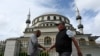 FILE - Muslims leave the Gallipoli Mosque after the first congregational Friday prayers held in the holy fasting month of Ramadan, in Sydney on April 16, 2021.