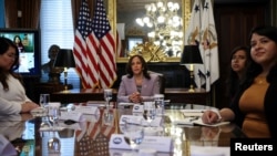 U.S. Vice President Kamala Harris meets with Deferred Action for Childhood Arrivals (DACA) recipients in her ceremonial office and via video conference, at the White House in Washington, July 22, 2021.