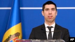 Moldova's Foreign Minister Mihai Popsoi speaks during joint statements with Romanian counterpart Luminita Odobescu, not pictured, in Bucharest, Romania, Feb. 6, 2024.