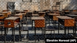 FILE - The benches of a school sit empty in Kabul, Afghanistan, Thursday, Dec. 22, 2022. (AP Photo/Ebrahim Noroozi)