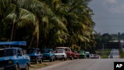 Vehicles line up for gas in Havana, April 24, 2023.
