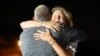 Elizabeth Whelan, right, hugs her brother Paul Whelan at Andrews Air Force Base, Md., following his release as part of a 24-person prisoner swap between Russia and the United States, Aug. 1, 2024.