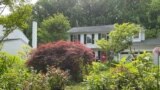 Janet and Jeffrey Crouch battled their homeowner's association for the right to keep their garden full of native plants rather than replacing them with grass, Columbia, Maryland, May 10, 2023. 