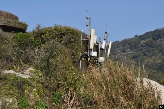 Telecom equipment is seen on top of a hill in Beigan, part of Matsu Islands, Taiwan on Sunday, March 5, 2023. (AP Photo/Huizhong Wu)