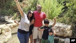 بنەماڵەی براداچ کە هەموویان جیا لە یەکێکیان بە بارمتە گیراون