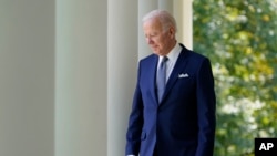 FILE - President Joe Biden walks out to the Rose Garden of the White House in Washington, Sept. 27, 2022.