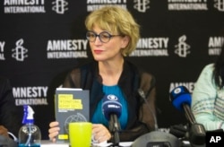 FILE - Amnesty International Secretary-General Agnes Callamard attends a news conference in Johannesburg, March 28, 2022.