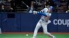 Los Angeles Dodgers designated hitter Shohei Ohtani grounds out during the seventh inning of an opening day baseball game against the San Diego Padres at the Gocheok Sky Dome in Seoul, South Korea, March 20, 2024. 