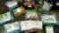 FILE - Plastic bags of fentanyl are displayed on a table at the U.S. Customs and Border Protection area at the International Mail Facility at O'Hare International Airport in Chicago, Nov. 29, 2017.