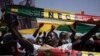 People shout slogans during a protest against the possibility of President Macky Sall to run for a third term in the presidential elections next year in Dakar, Senegal, May 12, 2023.