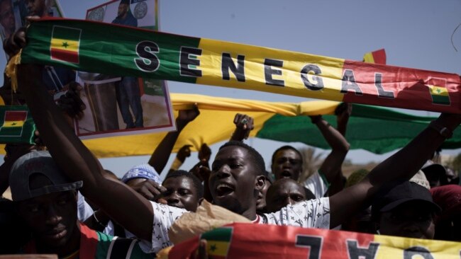 People shout slogans during a protest against the possibility of President Macky Sall to run for a third term in the presidential elections next year in Dakar, Senegal, May 12, 2023.