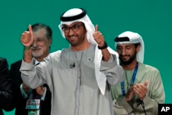 COP28 President Sultan al-Jaber gestures at the end of the COP28 UN Climate Summit, Dec. 13, 2023, in Dubai, United Arab Emirates.