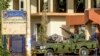 A vehicle of Sudan's Rapid Support Forces (RSF) paramilitaries is stationed outside the offices of Dar al-Mushaf (African Holy Koran Publishing House), in the south of Sudan's capital Khartoum on April 17, 2023.