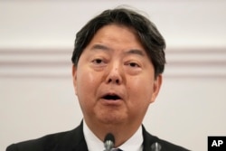 FILE - Japanese Foreign Minister Yoshimasa Hayashi speaks to reporters in Colombo, July 29, 2023.