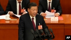 시진핑 중국 국가주석이 13일 베이징 인민대회당에서 전국인민대표대회(전인대) 제14기 1차회의 폐막연설을 하고 있다.