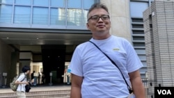资料照片：2023年9月25日，时任香港记者协会主席的陈朗升在被判阻差办公罪名成立并判监禁五日后，获准保释并等候上诉。