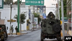 Arhiv - Nacionalna garda Meksika na ulicama grada Matamaros gdje su kidnapovani državljani SAD.