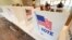 FILE - Empty poll kiosks await voters at the Mississippi Second Congressional District Primary election precinct June 7, 2022, in Jackson, Miss. 
