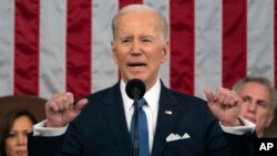 FILE — U.S. President Joe Biden delivers the State of the Union address in Washington, Feb. 7, 2023. He and first lady Jill Biden invited to this year's address a Texas woman who sued her state and lost over the ability to get an abortion.