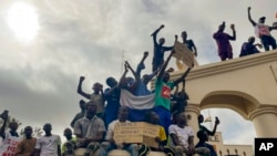 FILE - Supporters of Niger's ruling junta gather at the start of a protest called to fight for the country's freedom and push back against foreign interference in Niamey, Niger, Thursday, Aug. 3, 2023. 