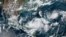 This image obtained from the U.S. National Oceanic and Atmospheric Administration (NOAA), shows tropical Storm Idalia (C) off the coast of Mexico, Aug. 27, 2023.