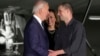 FILE - President Joe Biden, from left, and Vice President Kamala Harris greet reporter Evan Gershkovich at Andrews Air Force Base, Md., following his release as part of a 24-person prisoner swap between Russia and the United States, Aug. 1, 2024.