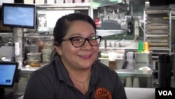 Alba Galdamez, an immigrant from El Salvador, is the chef at the Immigrant Food Restaurant's White House location. (Screen grab from video by Saqib Ul Islam/VOA)