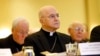 FILE - Archbishop Carlo Maria Vigano, apostolic nuncio to the US, listens to remarks at the US Conference of Catholic Bishops' annual fall meeting in Baltimore, Nov. 16, 2015. 