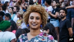 FILE - Rio de Janeiro Councilwoman Marielle Franco smiles for a photo in Cinelandia square, Jan. 9, 2018. Brazil’s federal police arrested, March 24, 2024, the men suspected of ordering Franco's killing in 2018, a long-awaited step after years of society clamoring for justice.