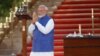 Perdana Menteri India Narendra Modi memberi isyarat saat upacara pelantikan di istana presiden di New Delhi, 9 Juni 2024. (Foto: Reuters)
