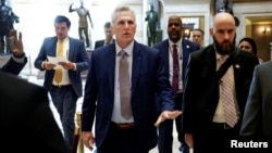 U.S. House Speaker Kevin McCarthy speaks with reporters as he walks to the House floor at the U.S. Capitol in Washington, Sept. 19, 2023.