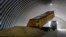 FILE - A dump track unloads grain in a granary in the village of Zghurivka, Ukraine, on Aug. 9, 2022. 