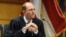 Fulton County (Ga.) Judge Scott McAfee addresses lawyers in the election interference case against former President Donald Trump, March 28, 2024, in Atlanta. Trump on March 29 sought a reversal of McAfee's ruling that let the Fulton district attorney stay on the case.