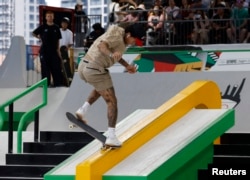 FILE - Nyjah Huston of the U.S. competes during the Olympic Qualifier Series 2024 Shanghai at Urban Park, Shanghai, China, May 19, 2024.