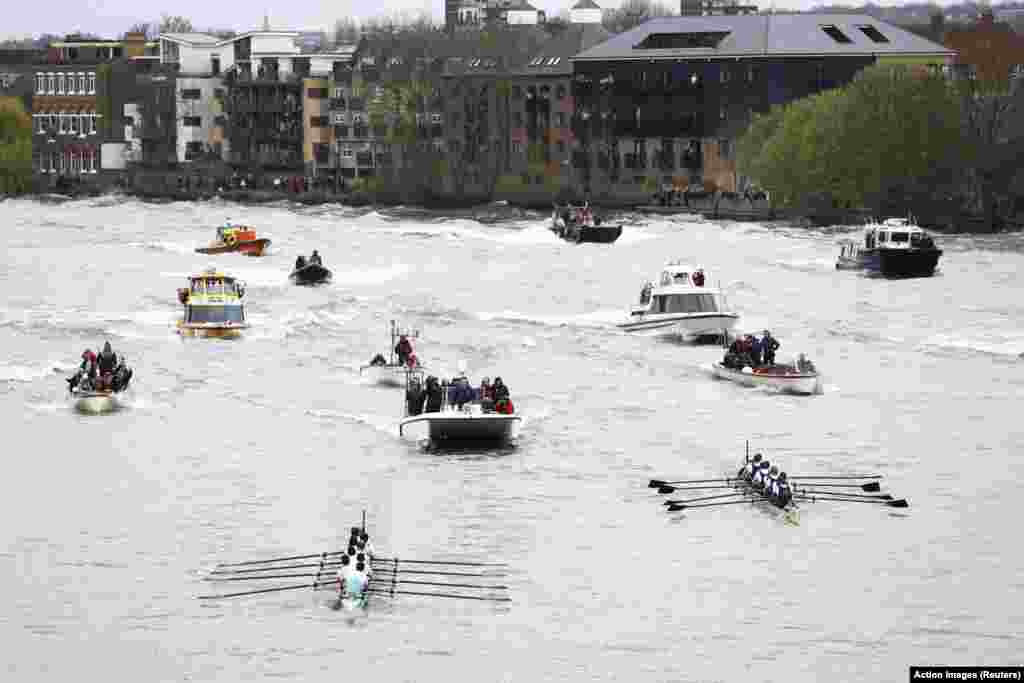 Cambridge is seen ahead of Oxford on their way to winning the men&#39;s race during the University Boat Race in River Themes, London.