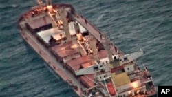 FILE - This photo made available by India's Press Information Bureau shows the Maltese-flagged MV Ruen. The Indian Navy said Saturday it is shadowing a bulk carrier that was boarded by unknown attackers in the Arabian Sea.