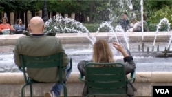 The Paris City Council's 2050 plan calls for many more fountains like this one. (Lisa Bryant/VOA)
