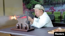 North Korean leader Kim Jong Un gives field guidance at a major weapon factory in this image released by North Korea's Korean Central News Agency on Aug. 6, 2023.