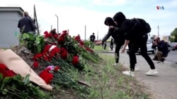 Մարդիկ ծաղիկներ են դնում Սանկտ Պետերբուրգում Վագների գրասենյակի դիմաց_1.mp4