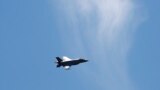 FILE - A fighter jet flies over Washington, June 12, 2019. Military planes were scrambled Sunday over the U.S. capital after a light aircraft violated its airspace and later crashed in southwestern Virginia.