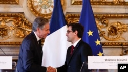 U.S. Secretary of State Antony Blinken, left, shakes hands with French Foreign Minister Stephane Sejourne during a joint press conference at the Ministry of Foreign Affairs in Paris, France, April 2, 2024.