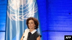 Direktur Jenderal UNESCO Audrey Azoulay menyampaikan pidato untuk mengumumkan permintaan Amerika Serikat untuk kembali ke lembaga tersebut, di kantor pusat UNESCO di Paris, 12 Juni 2023. (ALAIN JOCARD / AFP)