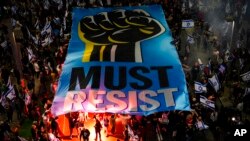 Israelis protest plans by Prime Minister Benjamin Netanyahu's new government to overhaul the judicial system, in Tel Aviv, Israel, March 4, 2023. 