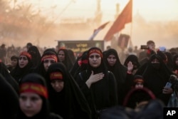 Pilgrims observe Arba'een in Karbala, Iraq, August 24, 2024. Tahseen Al-Khafaji, head of the Iraqi security media cell, said more than 3 million pilgrims had entered Iraq as of Friday.